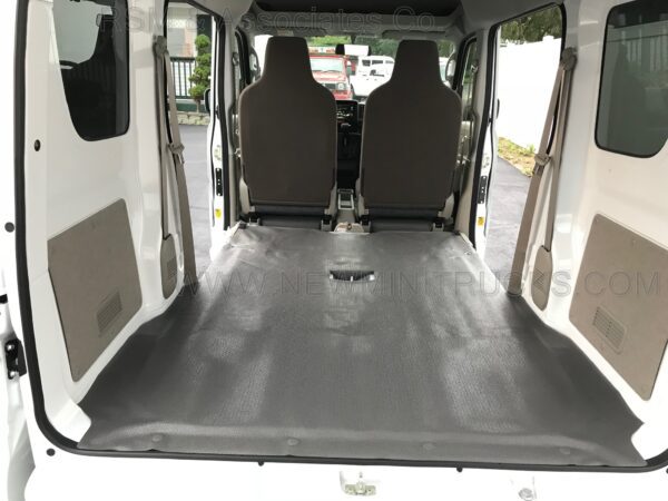 A van with the back seats folded down.