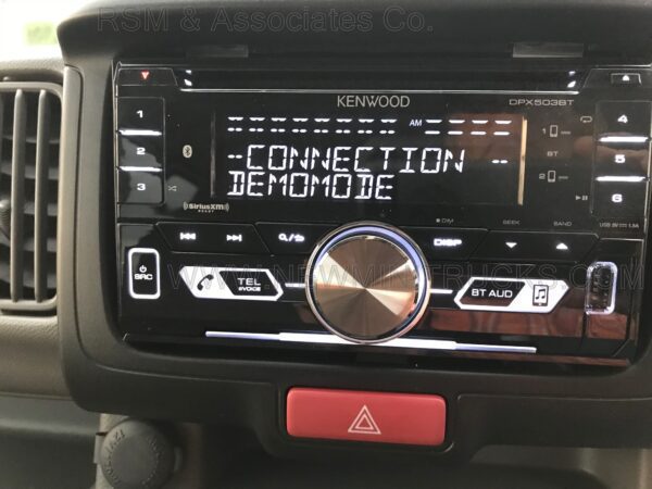 A car radio with the word connection and someone else 's name on it.