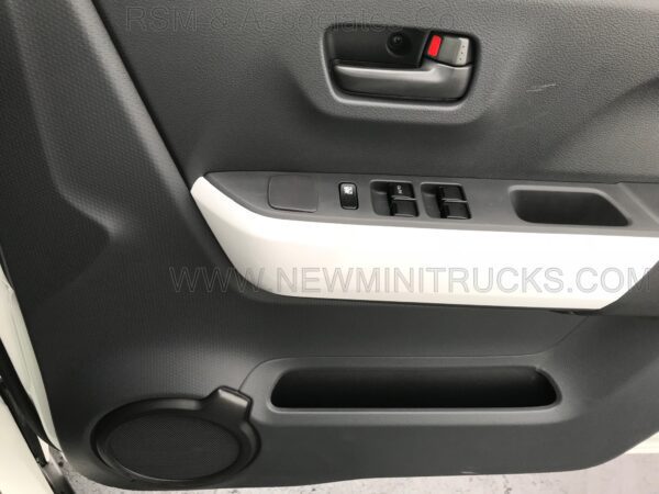 A close up of the door handle on an interior vehicle.