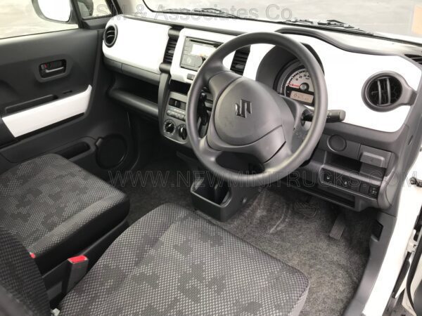 A car with the steering wheel and dashboard in it.