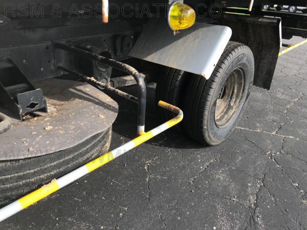 A close up of the front tire on a truck