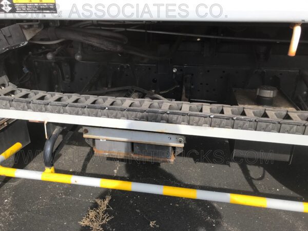 A truck with the tire tracks of an off road vehicle.