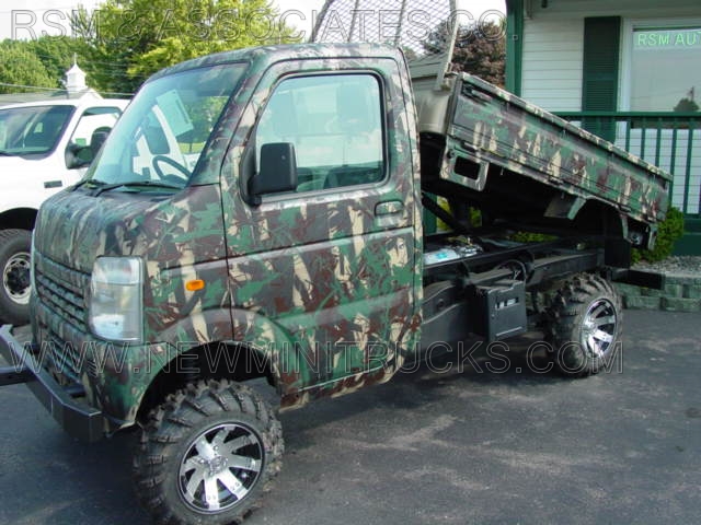 a mini truck with brown and green paint