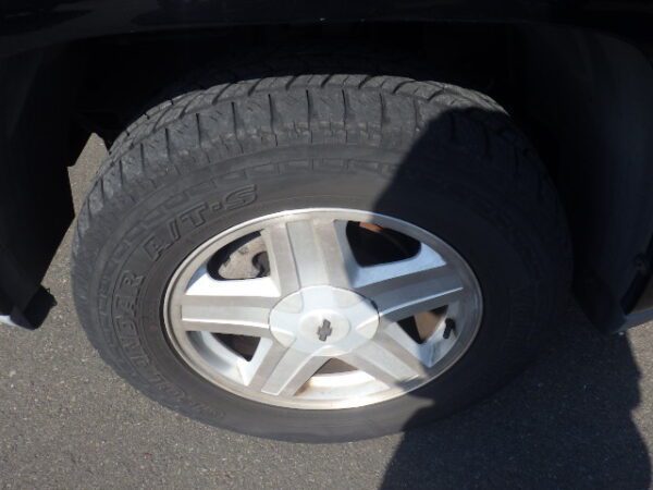 A close up of the tire on a car