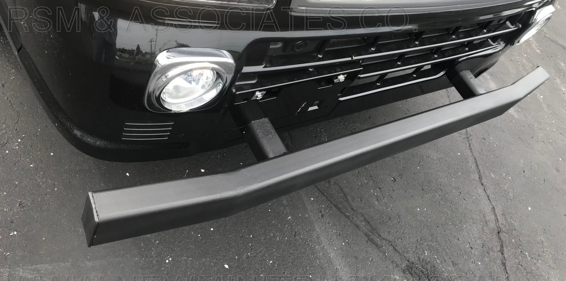 front bumper of a black vehicle