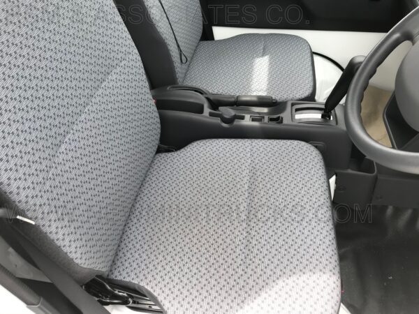 A car seat with the seats folded down.